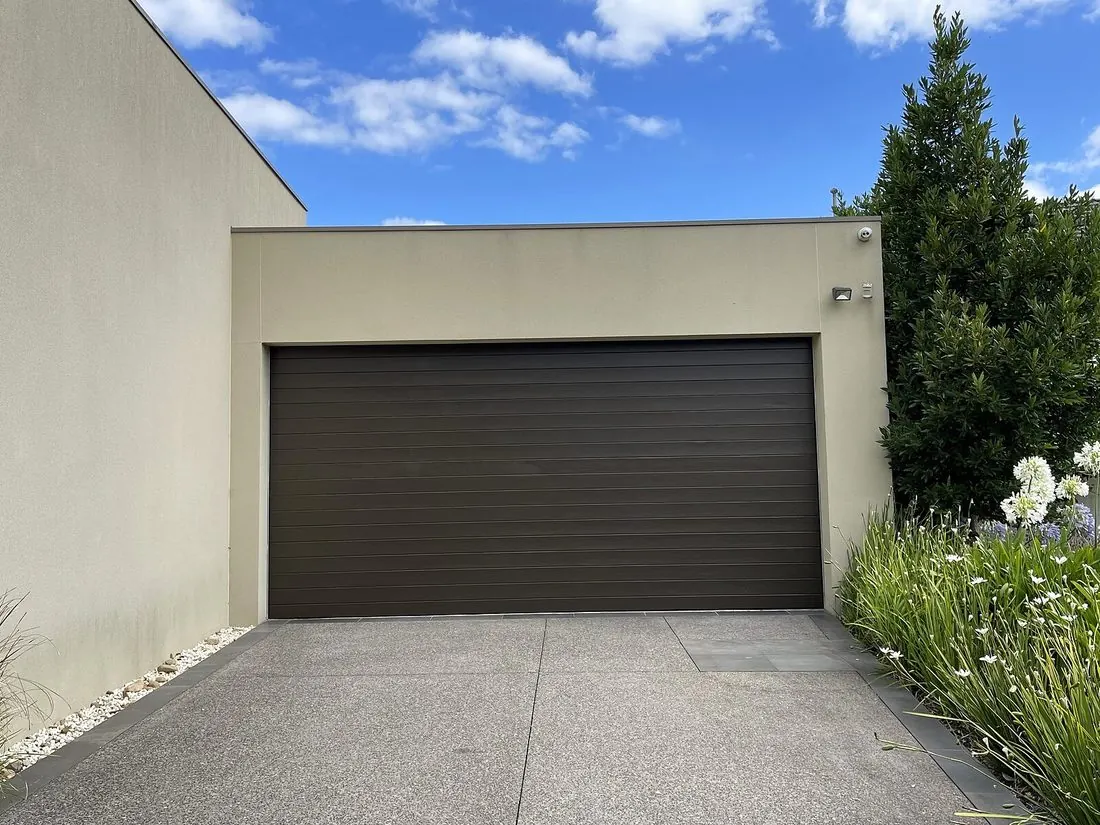 Garage door refinishing after painting in Pascoe Vale
