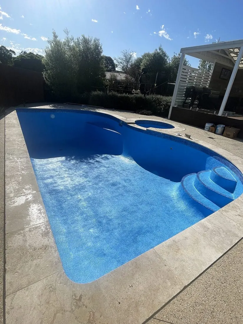 Concrete pool recoating after painting in Preston