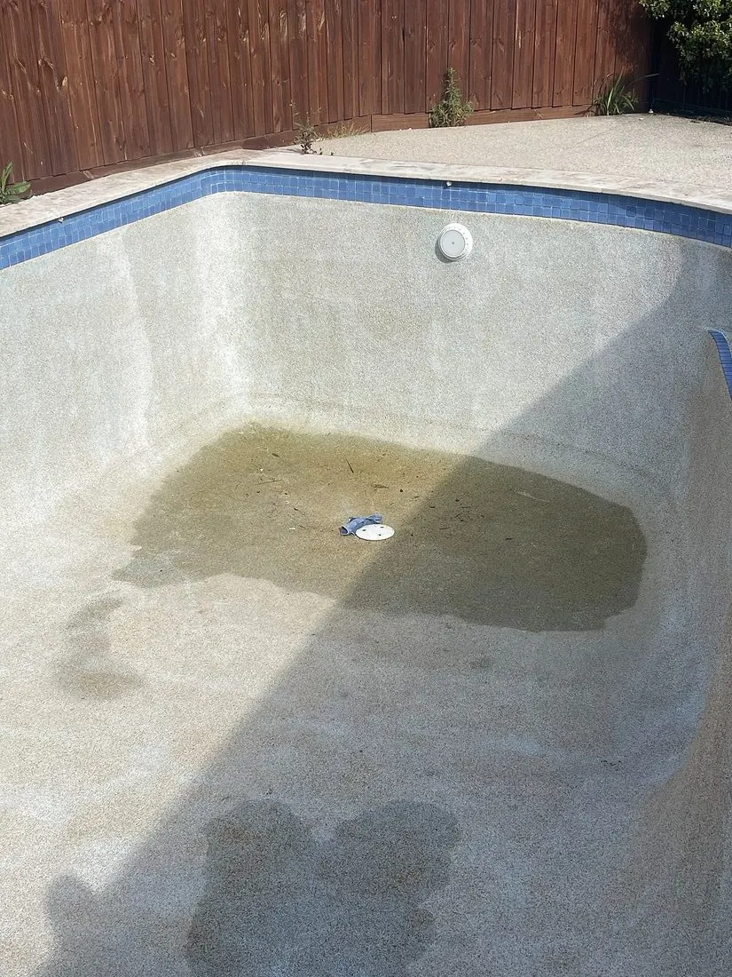 Concrete pool recoating before painting in Preston